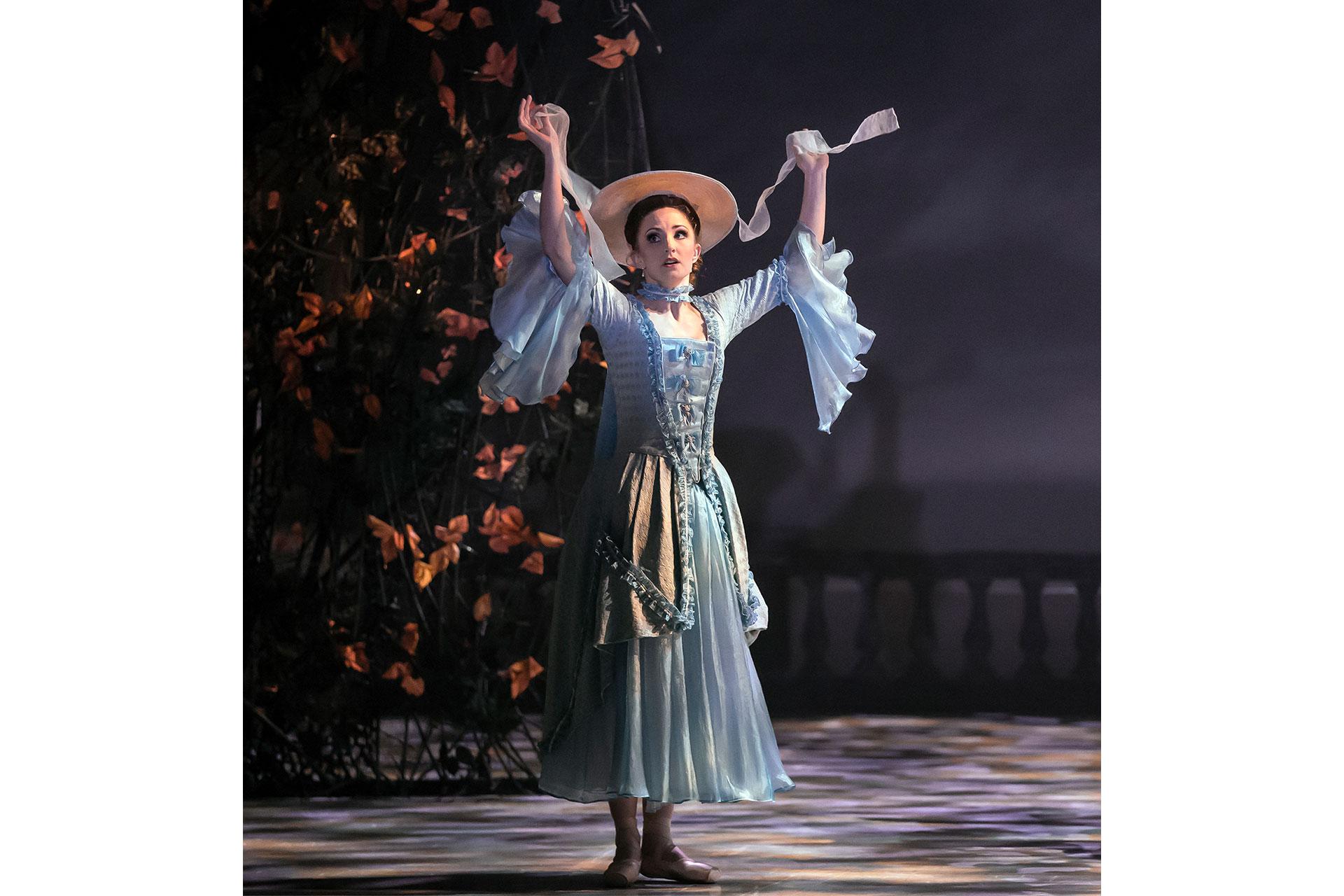 Isabella Linton throws her arms up in exasperation