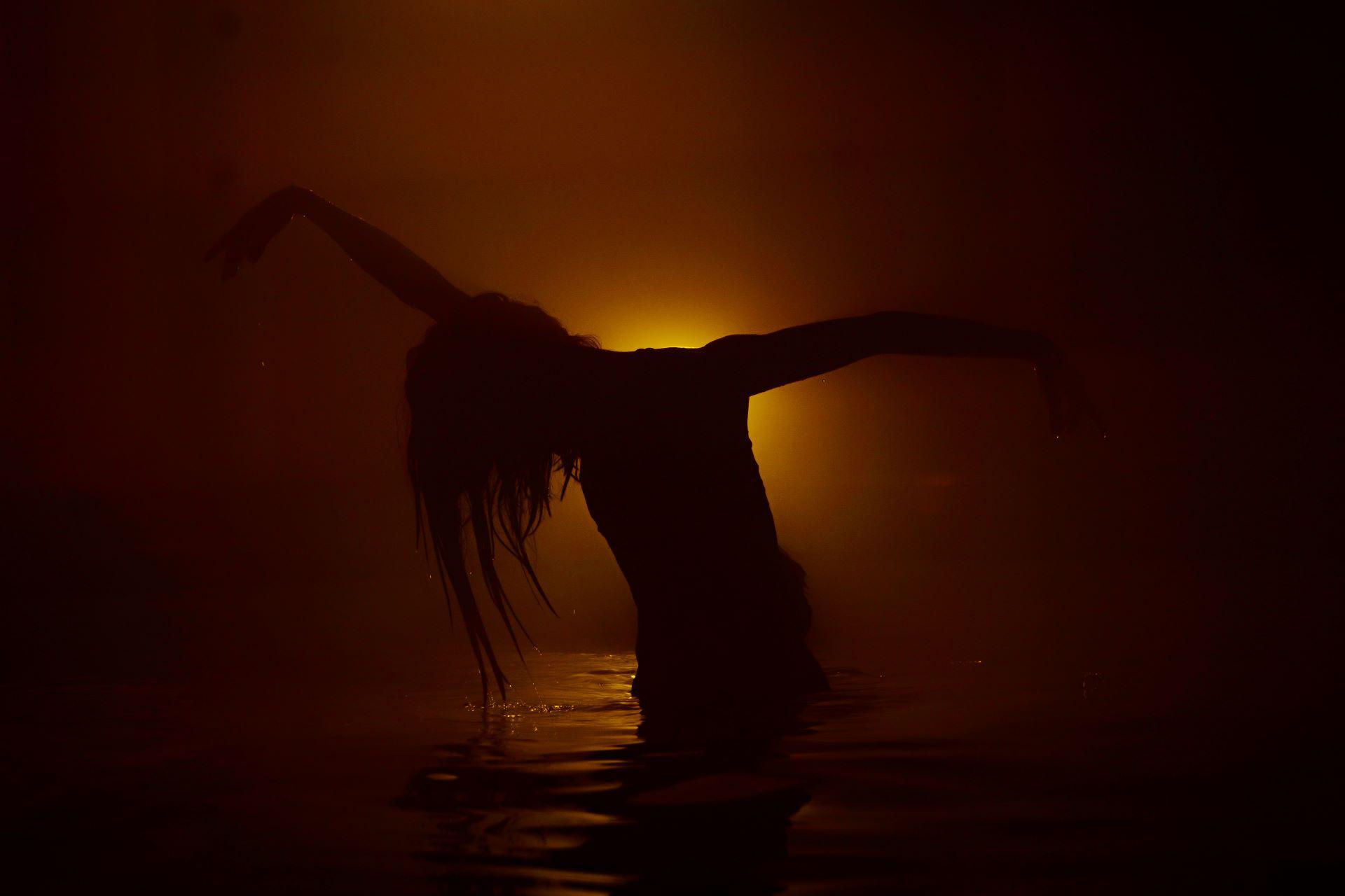 Dancer Minju Kang in water