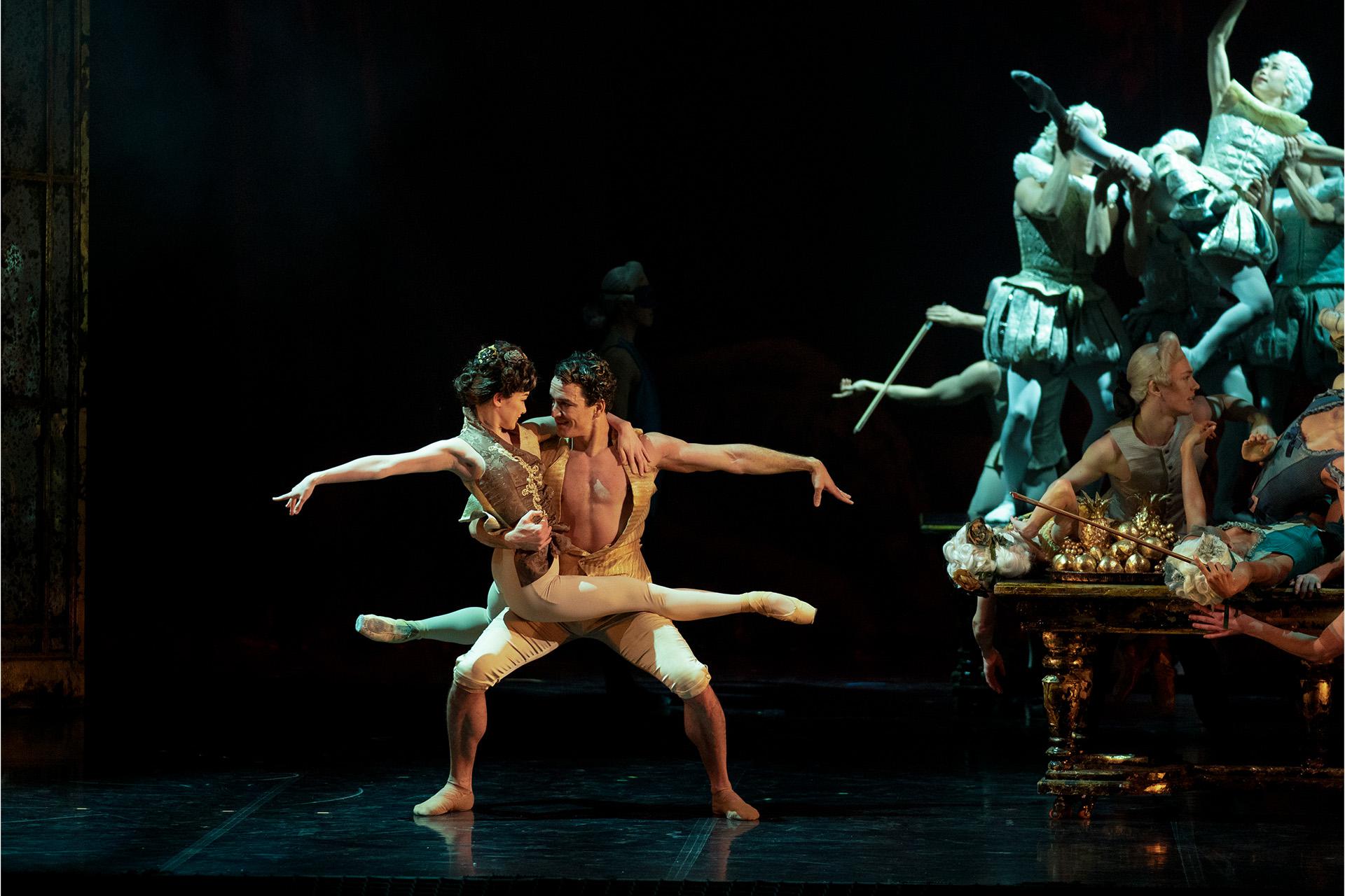 Casanova embraces and lifts Balletti while looking straight into her eyes