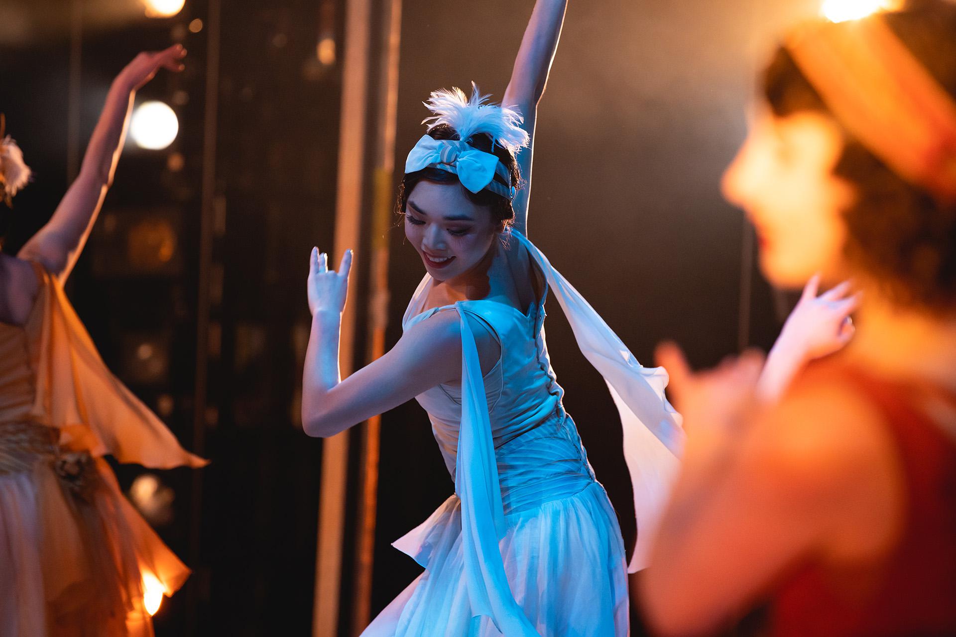 From the wings, a look at a dancer performing with gusto