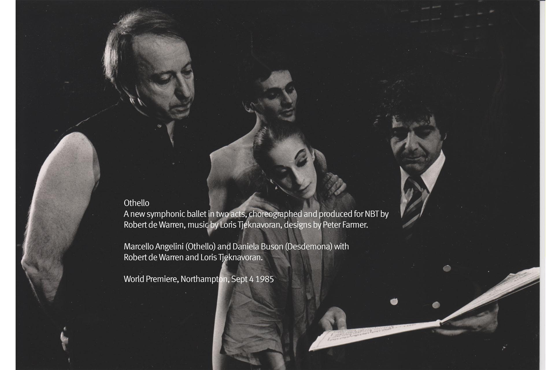 Black and white photos of four people looking through a book