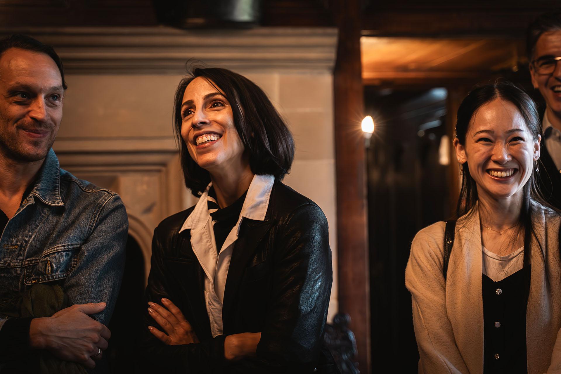 Luke Ahmet, Annabelle Lopez Ochoa and Saeka Shirai inside the home of Anne Lister, Shibden Hall in Halifax, all smiling.
