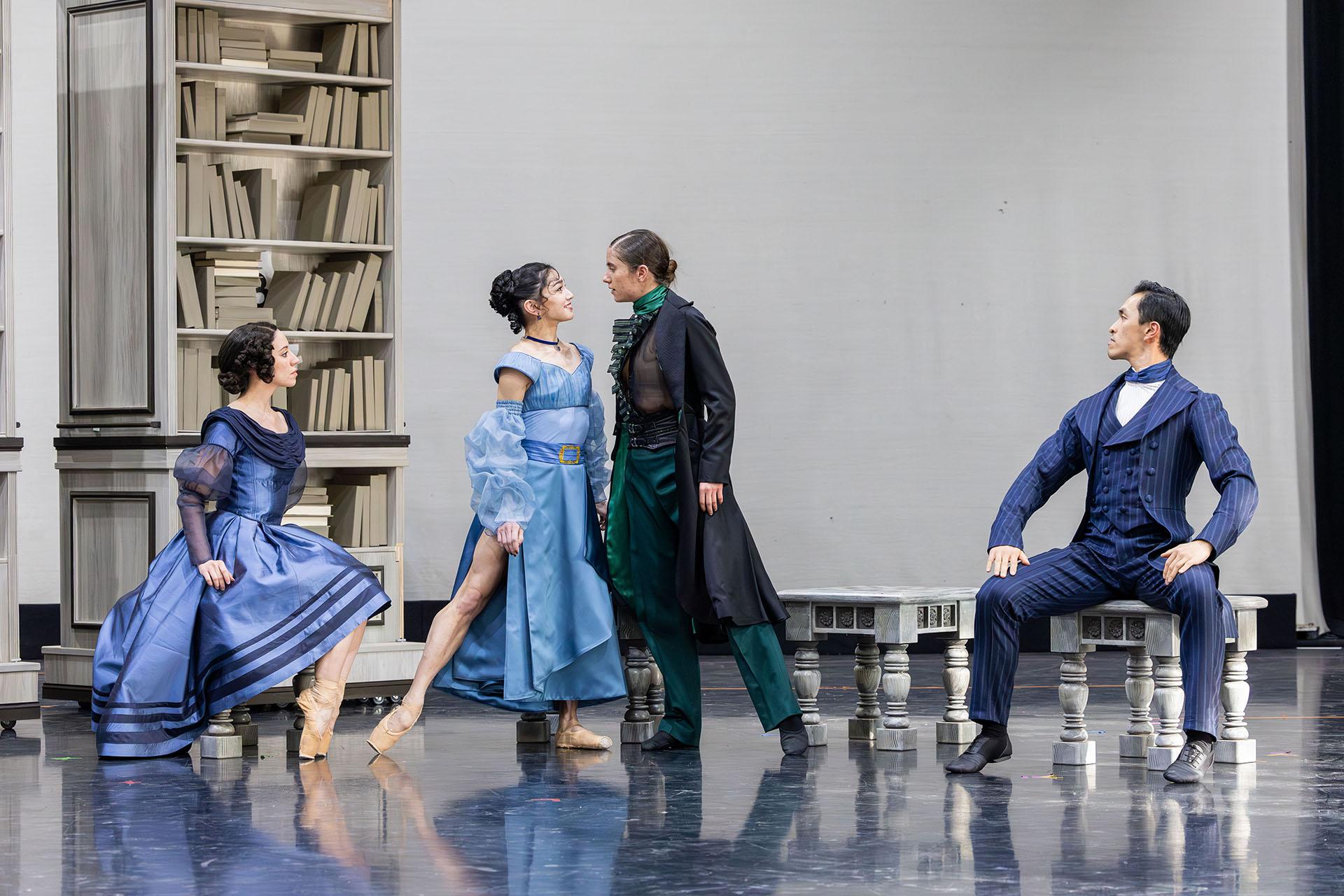 A woman in blue and Anne Lister gaze lovingly into one another's eyes