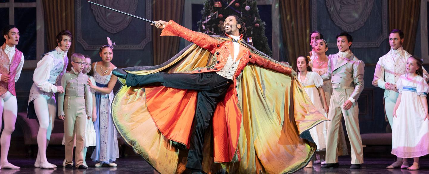 Uncle Drosselmeyer entertains the Edward's children and guests