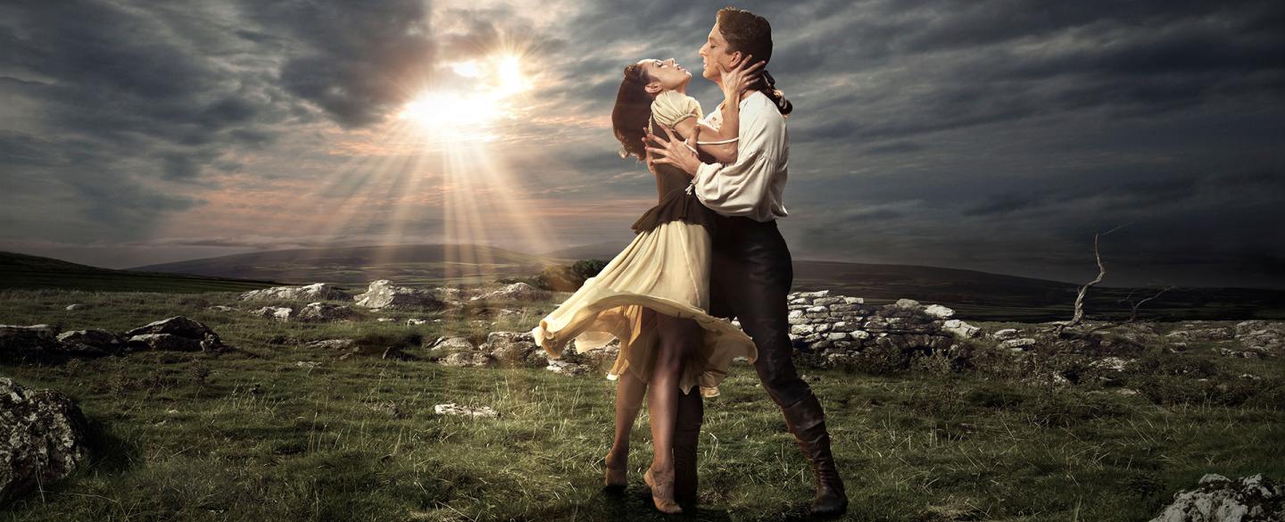 Cathy stands on her toes, reaching to Heathcliff in one of our publicity images