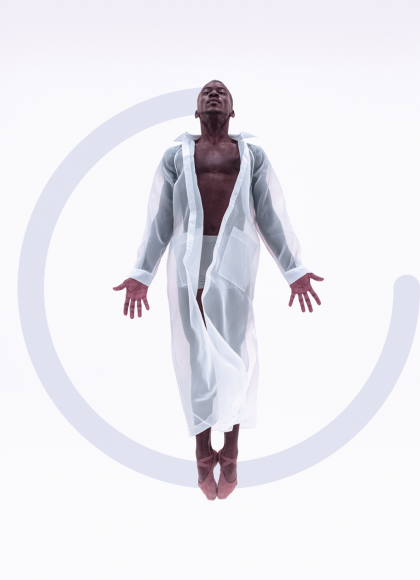 A man is floating in the air wearing a sheer white jacket, which is long sleeve and goes down to their ankles. The are looking up towards the sky with their palms faced to the front. There is a grey semi-cirle graphic added to the image behind the dancer. 