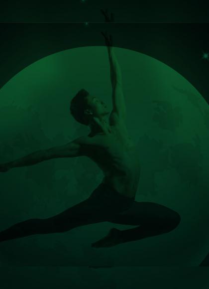 Black and green photo of boy leaping across the moon, the image is very dark and difficult to make out details