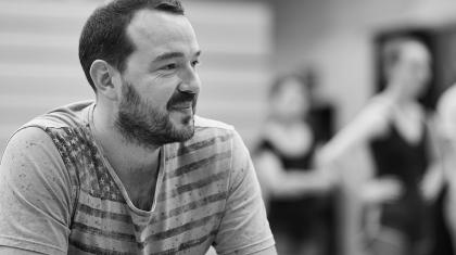 Choreographer Kenneth Tindall watches on as dancers rehearse his creation. Photo Justin Slee.