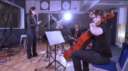 Alexandra Harwood conducting in rehearsals