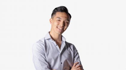 Male dancer headshot in light blue shirt