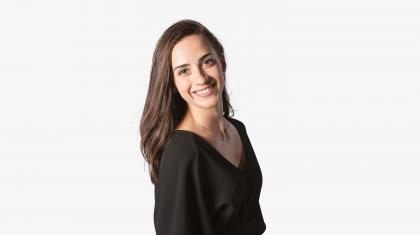 Headshot of a female dancer in a black top