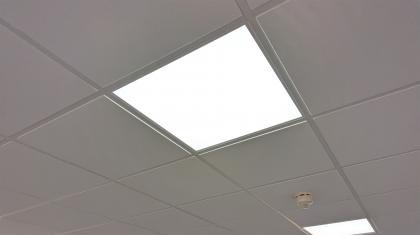 Ceiling tiles with regularly spaced out LED lighting squares